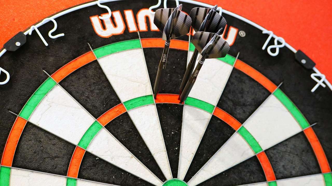 Close up of a well-used dartboard Close up of a well-used dartboard