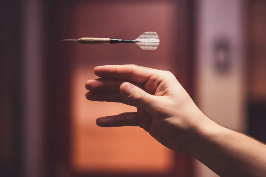 Jitse Van Schie preparing to throw a dart during a PDC Q-School match